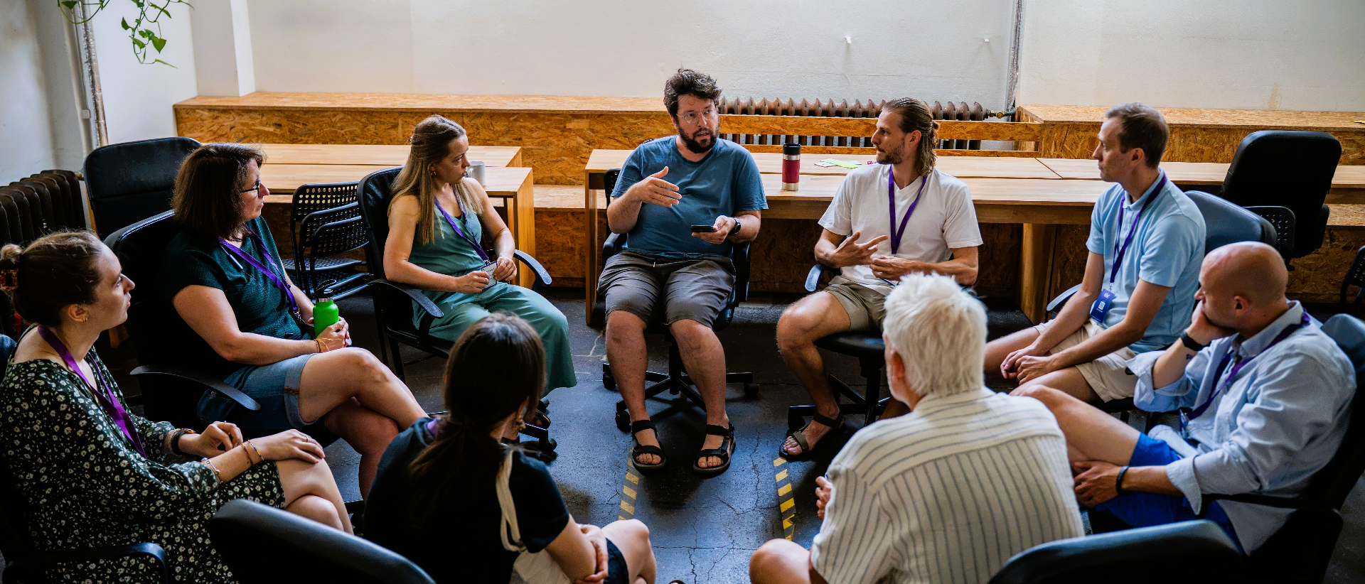 Groundwork participants in a circle discussion at a Berlin immersion